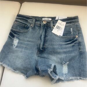 STS blue distressed Jean shorts. Size 25 high rise! New with tags.
